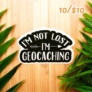 10 / $10 - “I’m Not Lost, I’m Geocaching” Sticker – Black & White with Arrow